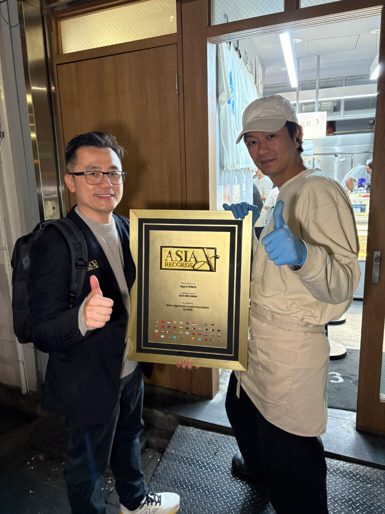 The official adjudicators from The Asia Records presenting Best Japanese Cream Sandwich in 2025